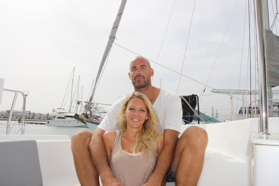 Happy couple sailing