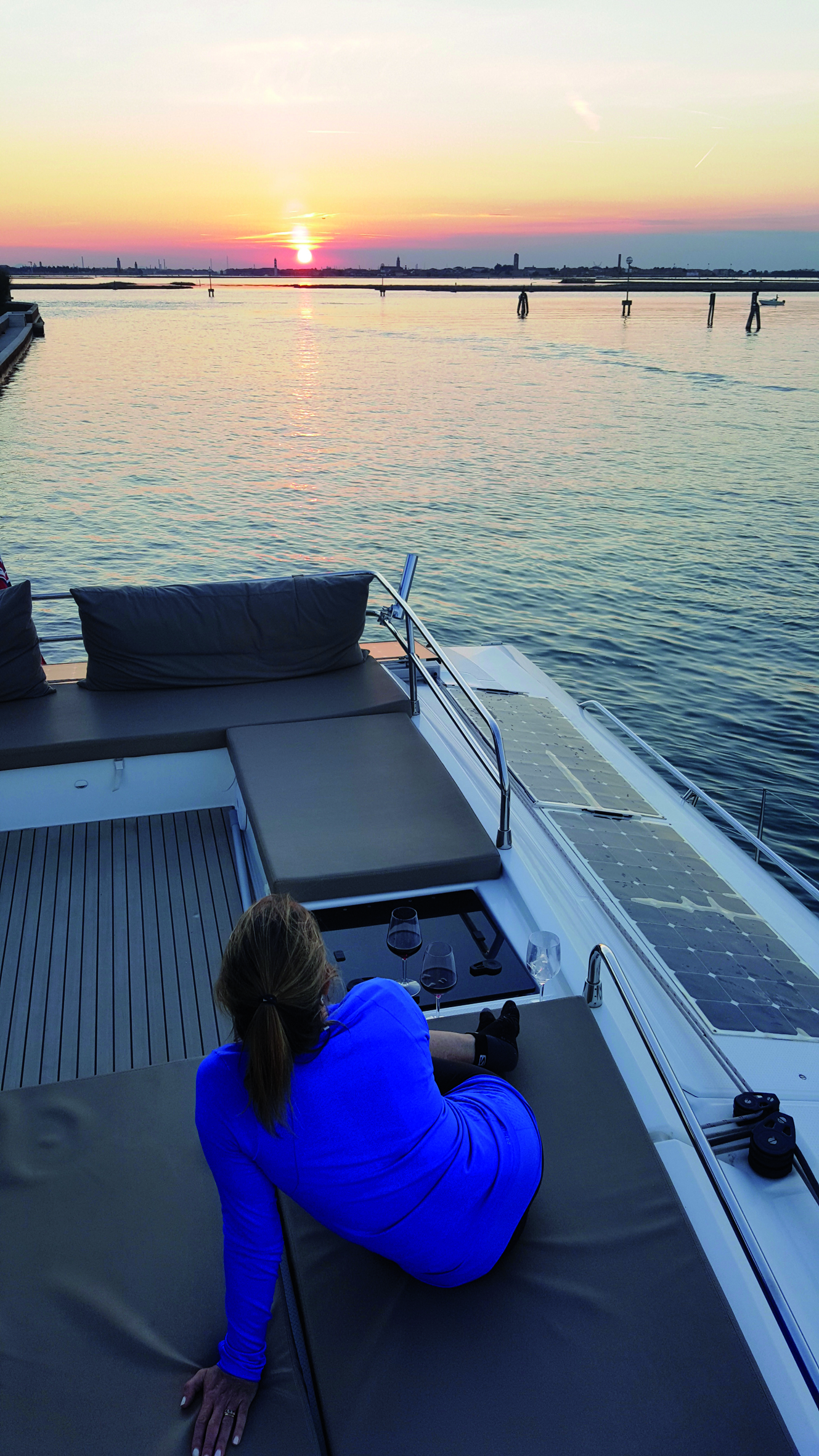 Sunset over Venice and yet the catamaran is alone in the anchorage…