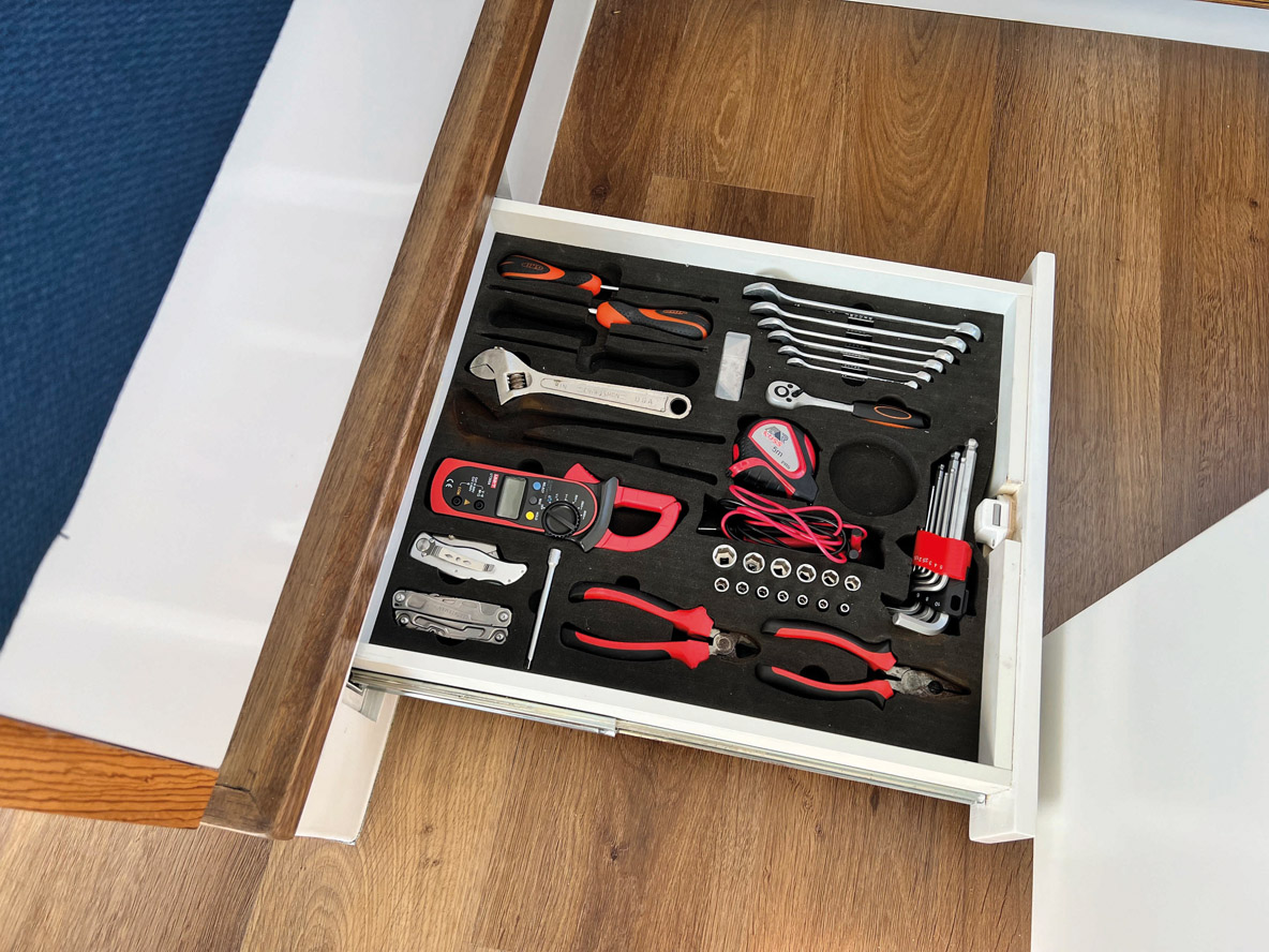 The 442 is full of storage, some of which is very clever, like this drawer for tools under the couch.