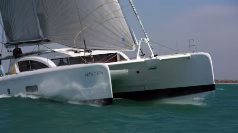 How about sheeting in a bit more? Cats do go upwind! 