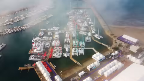 Wednesday, April 12 at 9am, an hour to go before the opening of the International Multihull Show.  ght on the beach.