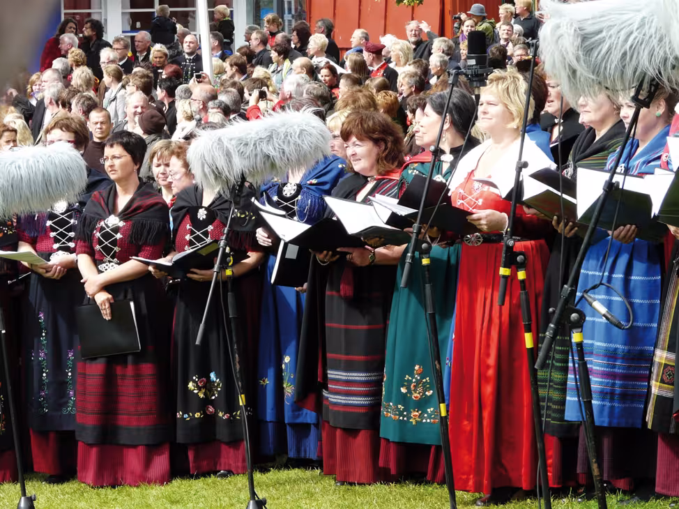 The national holiday in Tórshavn (Faroes). Note the microphone protection for sound recording in a force 10... 