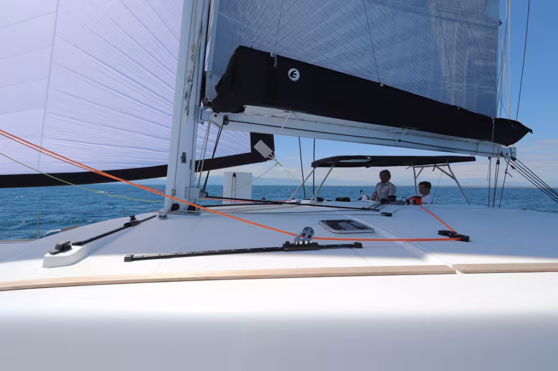 The Catana OC features a combined maneuvering and steering station to starboard. While most Catanas have had a helm on either hull for over 30 years, the first model  -  the Catana 40 - had a wheel against the back of the coachroof, as shown in this image