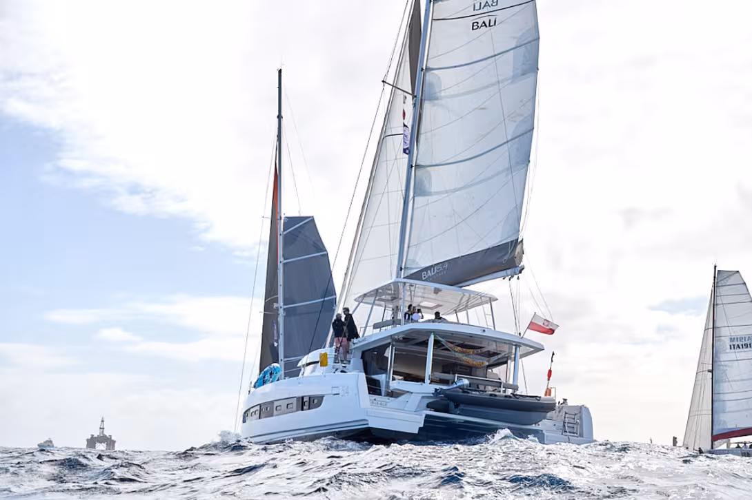 A short north-easterly swell shook the fleet up a little before bearing away on a long downwind run past the island. ©ARC