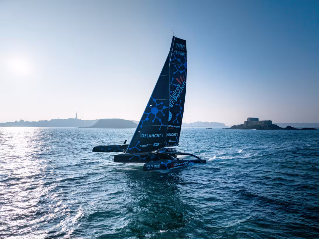 Departing Saint-Malo, Brittany, with everything up on an almost flat sea.